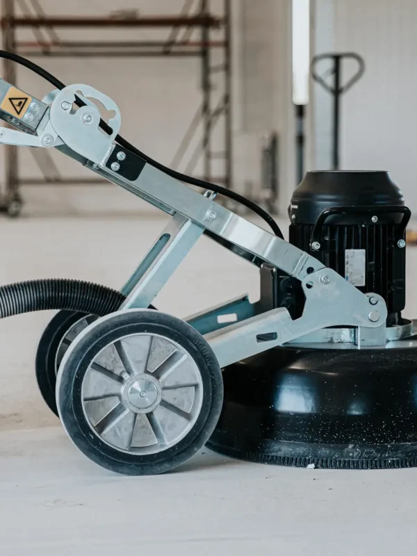 machine polishing surface floor smoothing and finishing hardener or epoxy concrete in the factory